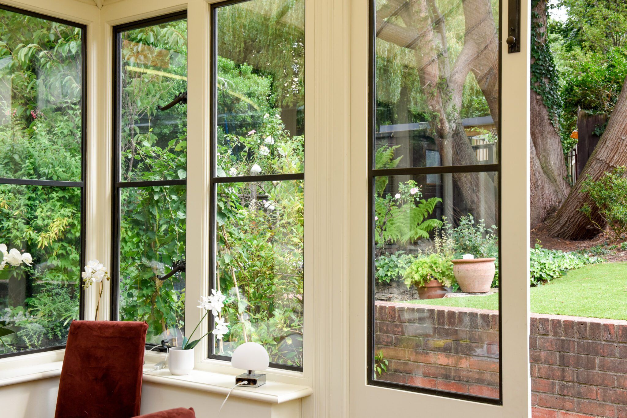 Black framed windows in home office