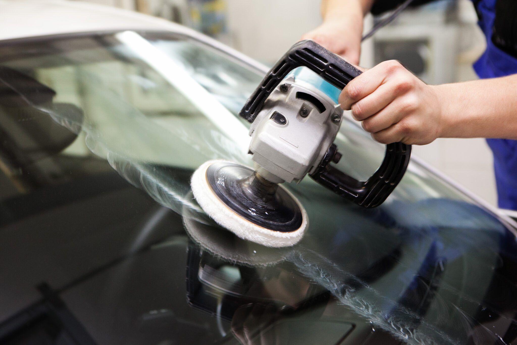 Close up of replacing windshield glass