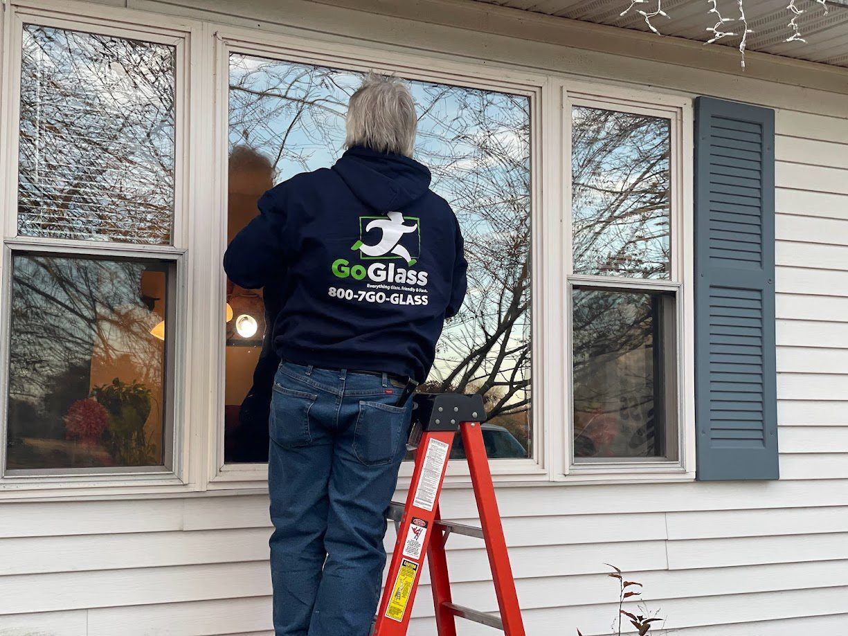 Goglass employee installing window glass