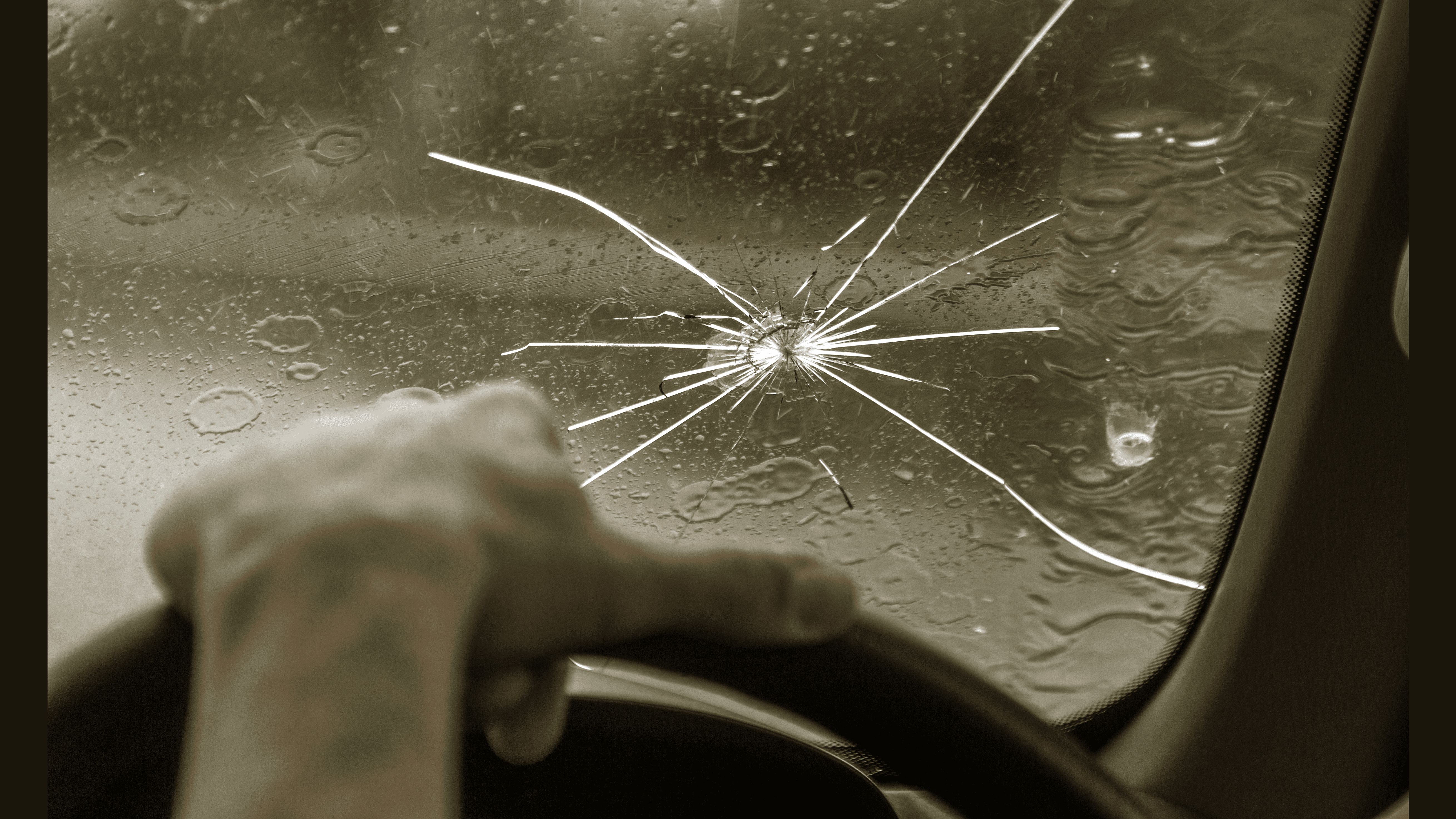 Crack in rainy windshield