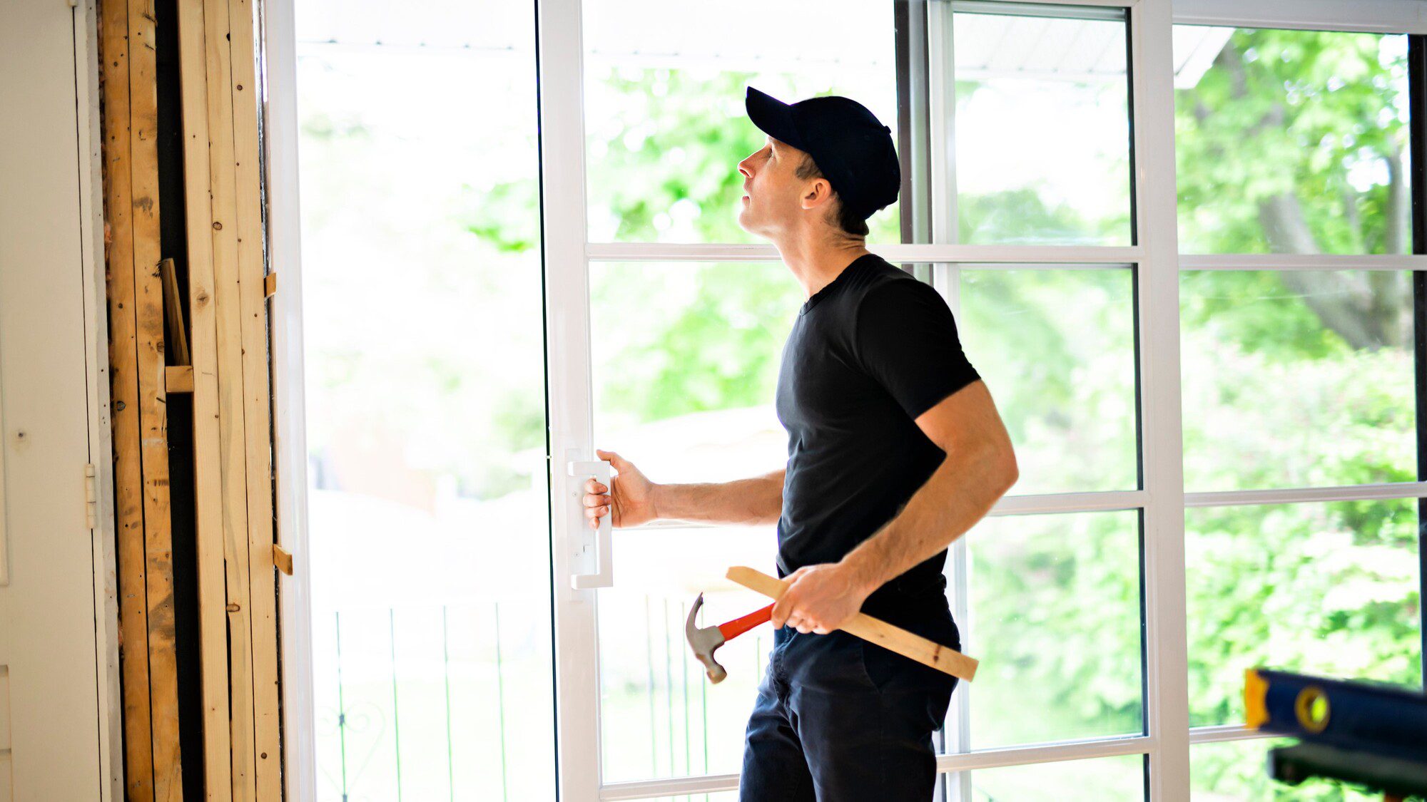 GoGlass contractor installing new sliding glass patio door